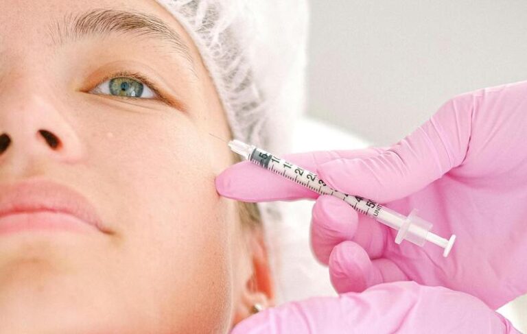 Woman getting mesotherapy on the face